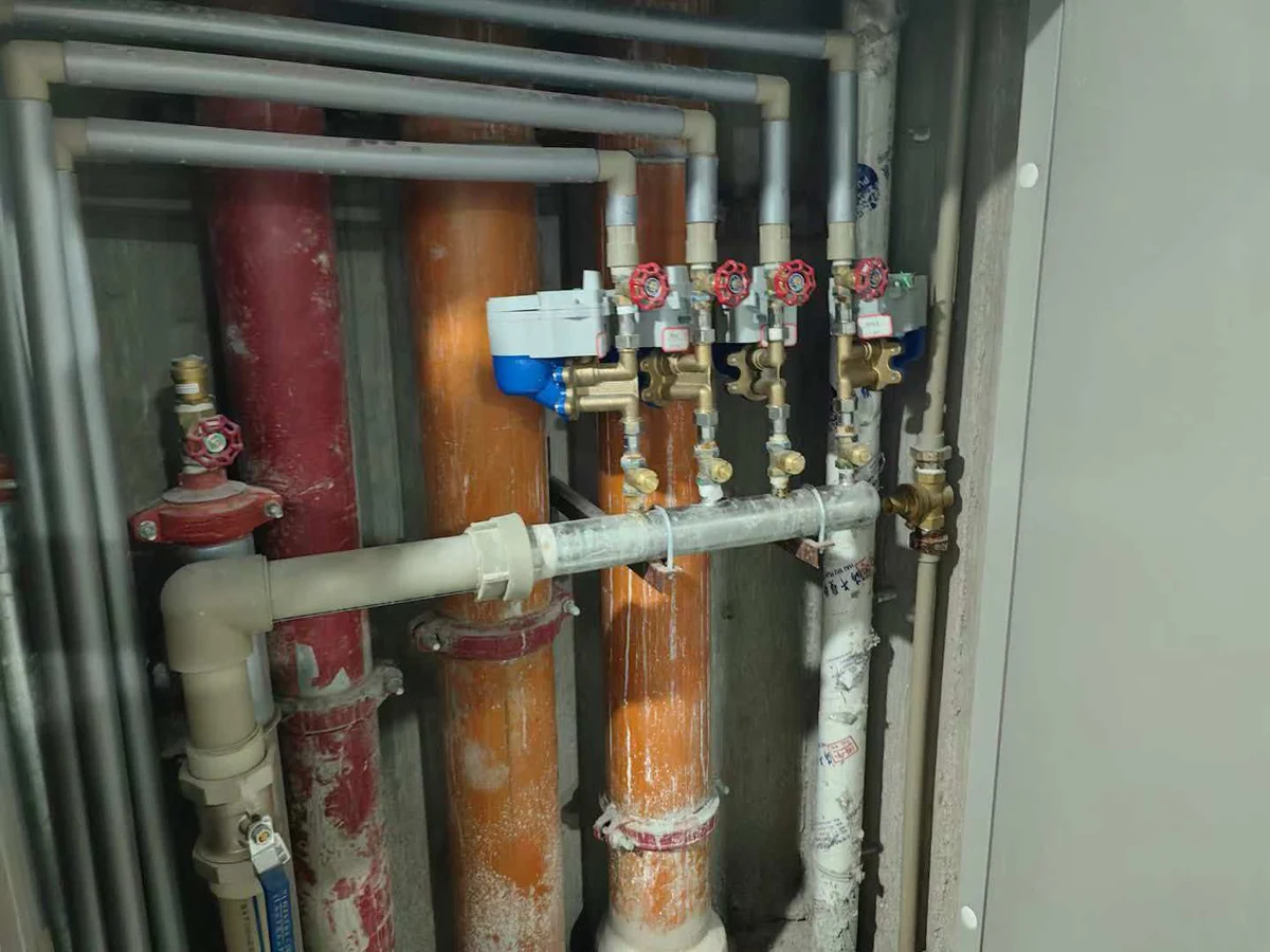 Sub-meters installed on a riser in a commercial building