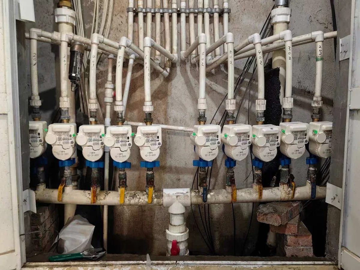 Bank of sub-meters serving individual units