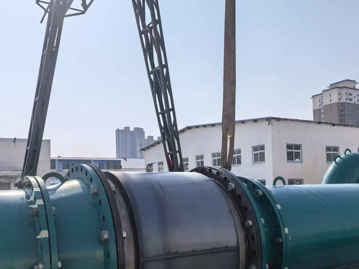 Large-diameter bulk meter being positioned for installation